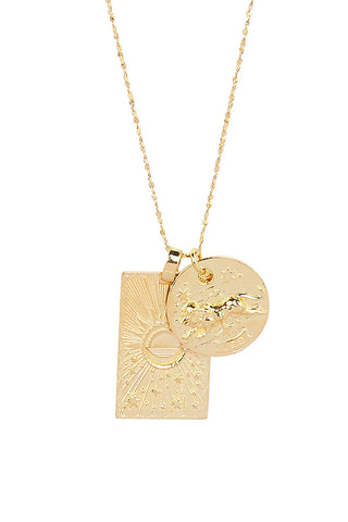 close-up-front-view-of-spell-s-leo-stargazer-zodiac-necklace-charms-one-charm-is-of-a-rectangular-shape-and-features-a-sun-with-stars-while-the-other-charm-is-circular-and-features-the-zodiac-label-and-icon